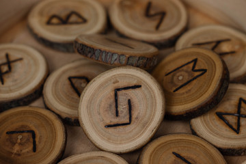 round wooden runes