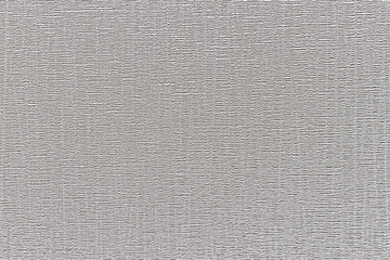 abstract background of white embossed paper close up