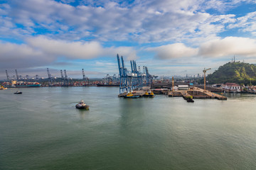Colon Container Terminal (CCT) in Panama. View of the industrial Colon Container Terminal (CCT), Panama. This is used for import, export, logistic and transportation, Container ship loading and unload