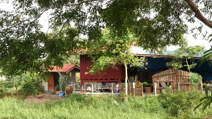 Ratchaburi, Thailand : August 10 2020 : Simple wooden house  in countryside, Suan Phueng, Thailand  © Veruree