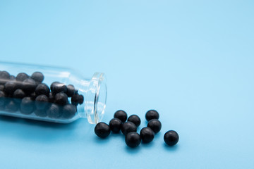 Herbal medicine LuVey VS Chemical medicine the alternative healthy care on blue background.