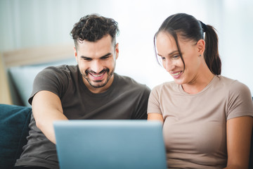 business work from home concept, young couple working with laptop at home