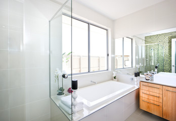 Naklejka na ściany i meble A bright bathroom in new luxury home