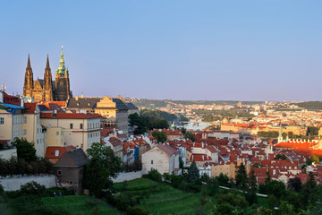 Prague at sunset. View from Petrin Hill. Visible Prague Castle and the Vltava River