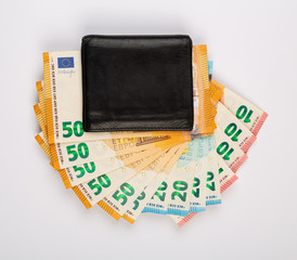 Liasse de billets dans un porte monnaie