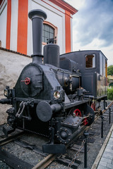 Fototapeta na wymiar Small retro steam railway locomotive Krauss München manufactured in 1897, Litomerice, Czech Republic.