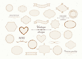 Fototapeta premium Vector set hand drawn, vintage labels and frames in retro style. isolated insignias or logotypes set. Various design elements for business signs or logos, labels, badges, tags or stamps.