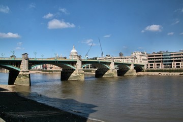 A view of St Pauls Cathedral across the river Thames