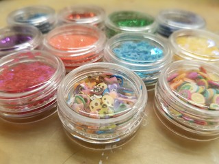 Festive colorful sequins in jars