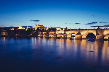Charles Bridge over River Vltava in Prague at Night and  St Vitus Cathedral