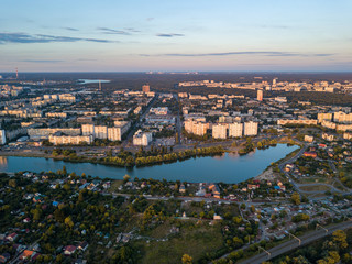 Aerial drone view. Sunset over the city.