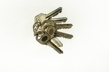 Two sets of keys on white background.