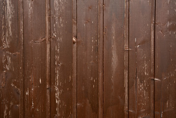 Brown wooden background with vertical boards.