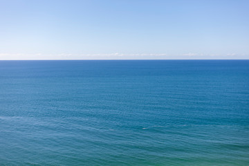 Fototapeta na wymiar Scenic view sea in bright sunny day