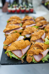 Outdoor catering banquet in summer. Snack and sandwich table at the banquet