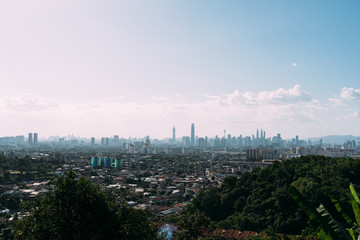 Aerial view of a city with the skyscrapers in the background