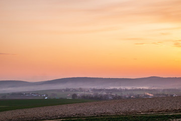 Fototapeta na wymiar Sunset over the field 