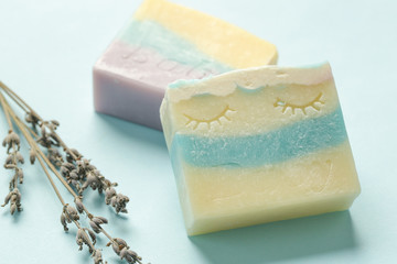Handmade soap bar with dry lavender flower, close up. Homemade toxic-free natural organic cosmetic	