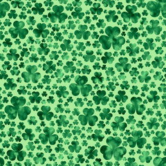 Watercolordark-green clover leaves on  light-green background. St.Patrick 's Day. Seamless pattern. Watercolor stock illustration. Design for backgrounds, wallpapers, covers, textile, packaging.