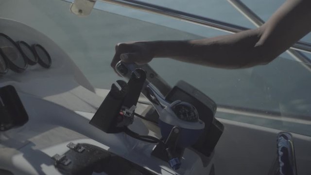 man push the lever of a boat