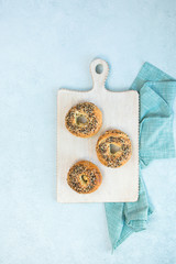 fresh baked bagels on a serving board