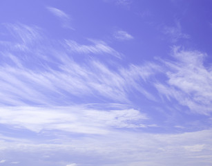 Obraz premium White clouds and purple sky. Blurred clouds background.