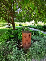 Unique trash can with beautiful green background