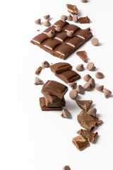 chocolate pieces on white background