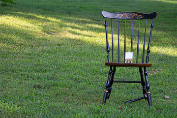 canvas, chair on the grass 