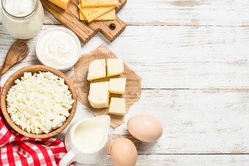 Dairy product at white wooden table.