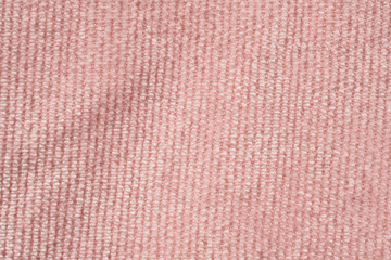 Pink fabric cloth texture background close up