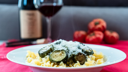 Italian food: pasta with zucchini and parmesan