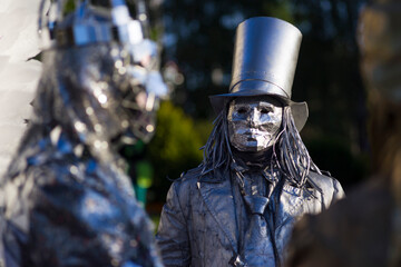 street man statue in a metal