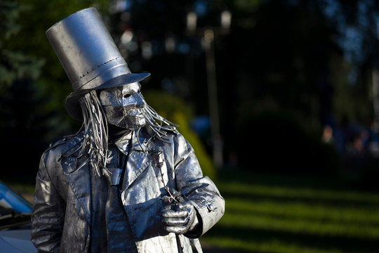 street man statue in a metal