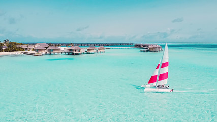 Maldives atoll island Aerial view Yacht