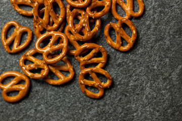 salted pretzels on a dark background