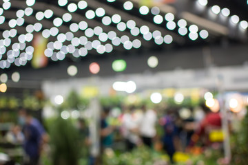 Abstract people walking in exhibition blurred background