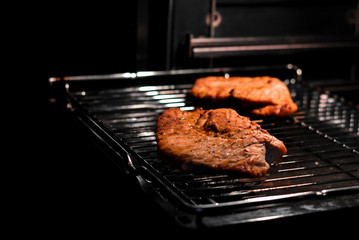 The meat is in the oven. Juicy, crispy meat is easy to cook in a good oven.