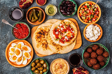 Fototapeta na wymiar Traditional dishes of Israeli and Middle Eastern cuisine