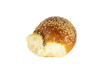 Slice of bun with sesame seeds and poppy seeds on a white plate