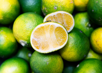 Close up of fresh organic green tangerine.