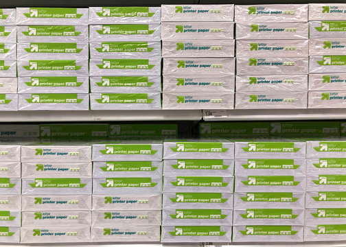 Alameda, CA - Aug 12, 2020: Store shelves with stacks of letter size printer paper in 200 quantity packs. Back to school supplies.