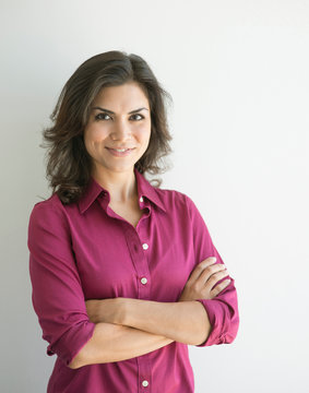 Mixed race businesswoman smiling