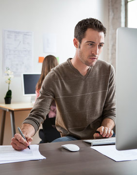 Caucasian architect working in office
