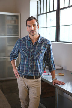 Caucasian businessman standing in office