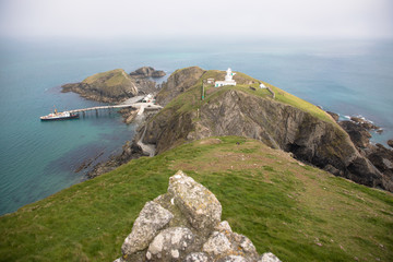 Views of the southern end of Lundy Island with a misty sky, The Bristol Channel, Devon, UK