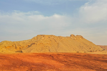 Fototapeta na wymiar Geological landscape of Jabal Jais characterised by dry and rocky mountains, Mud Mountains in Ras Al Khaimah, United Arab Emirates 