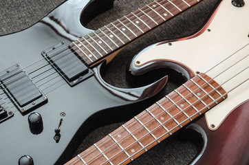Naklejka premium electric guitar and bass guitar on a gray background