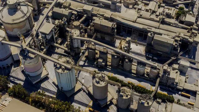 Aerial view on a huge heavy industrial factory complex at Nesher, Israel, drone 4k