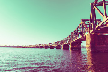 Steel truss railway bridge across Tauranga harbour.